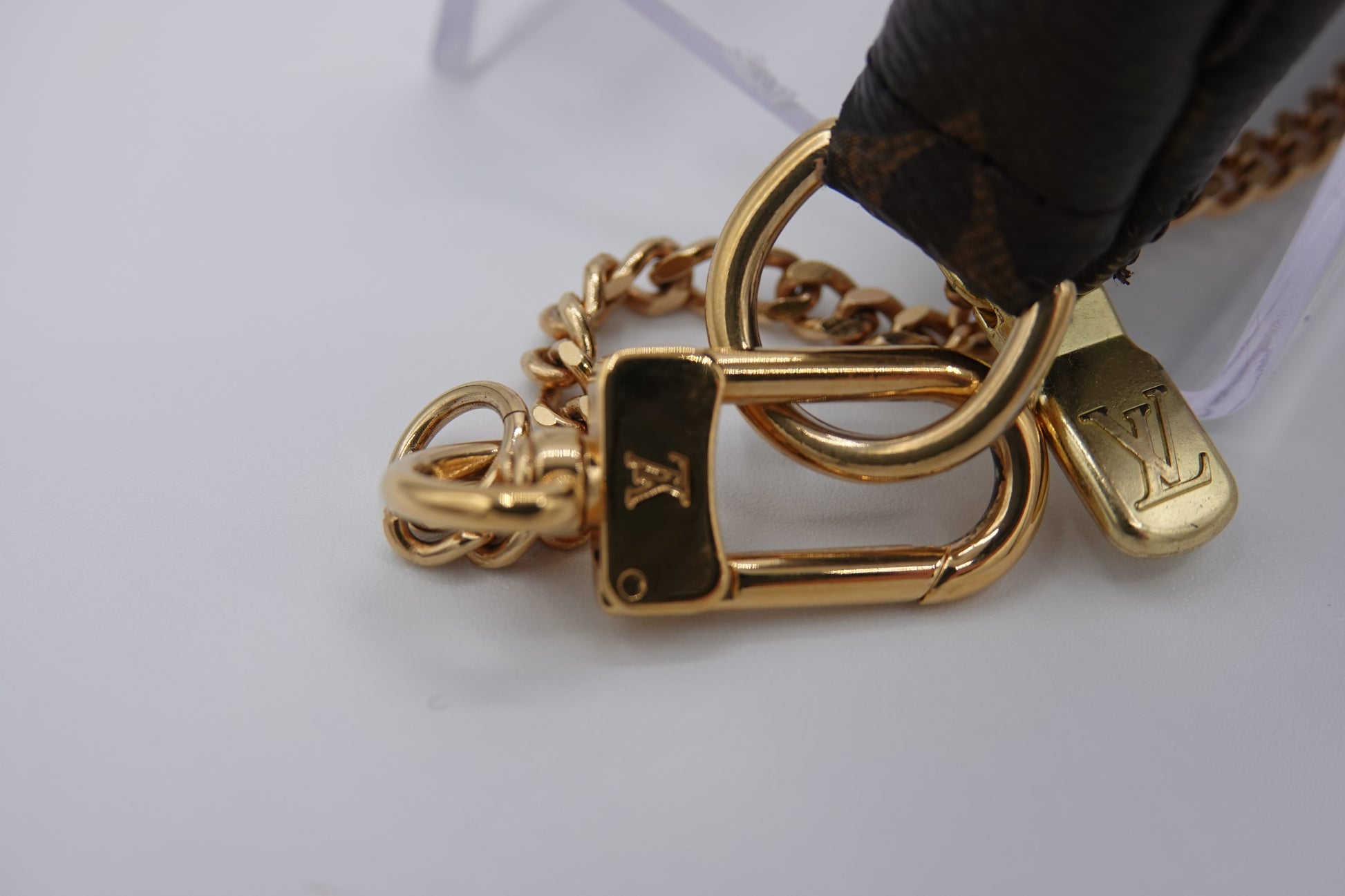 clasp Louis Vuitton brown canvas  Monogram Mini Pochette Accessories gold hardware
