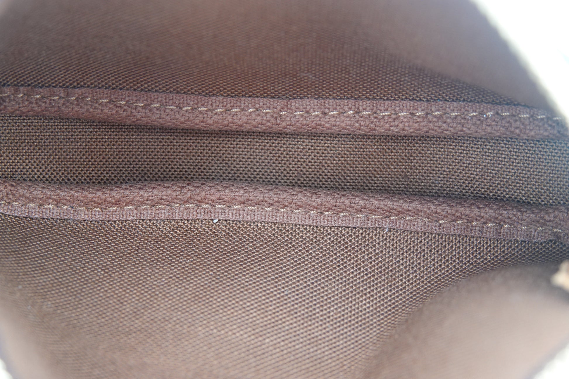 interior Louis Vuitton brown canvas  Monogram Mini Pochette Accessories gold hardware
