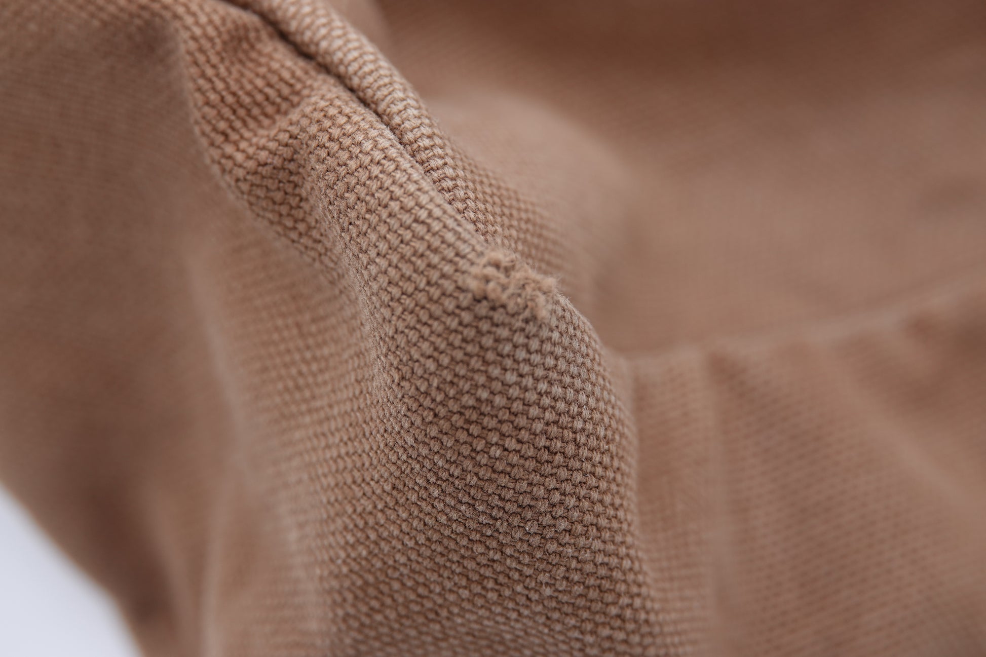 Close-up of brown fabric texture