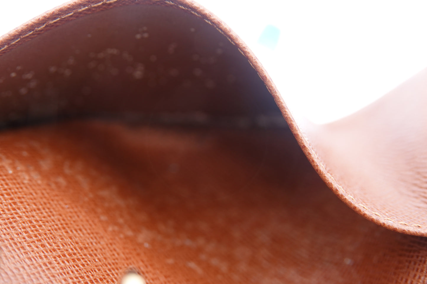 Close-up of brown leather surface with visible texture