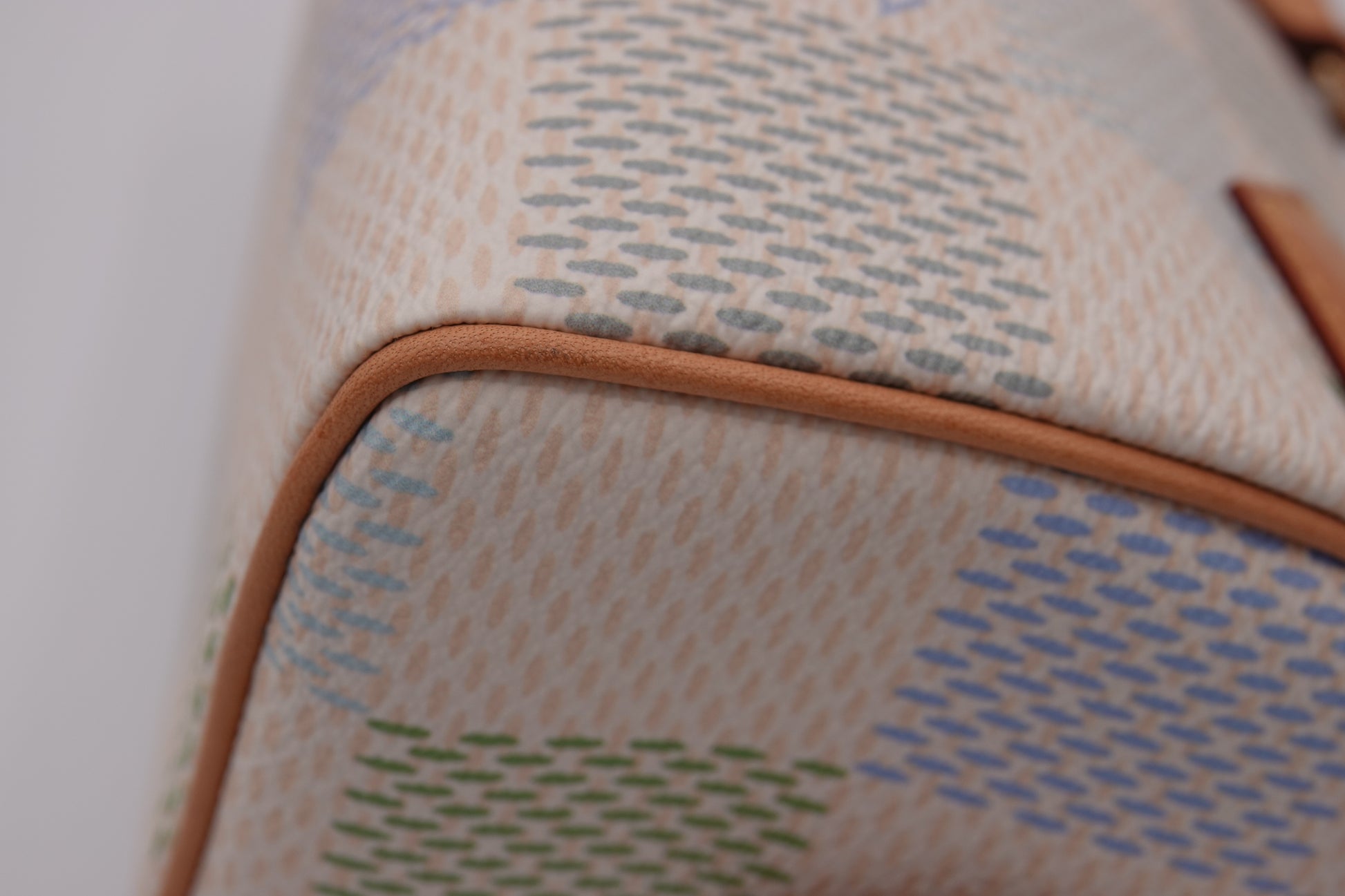 Close-up of a textured fabric surface with a patterned design.