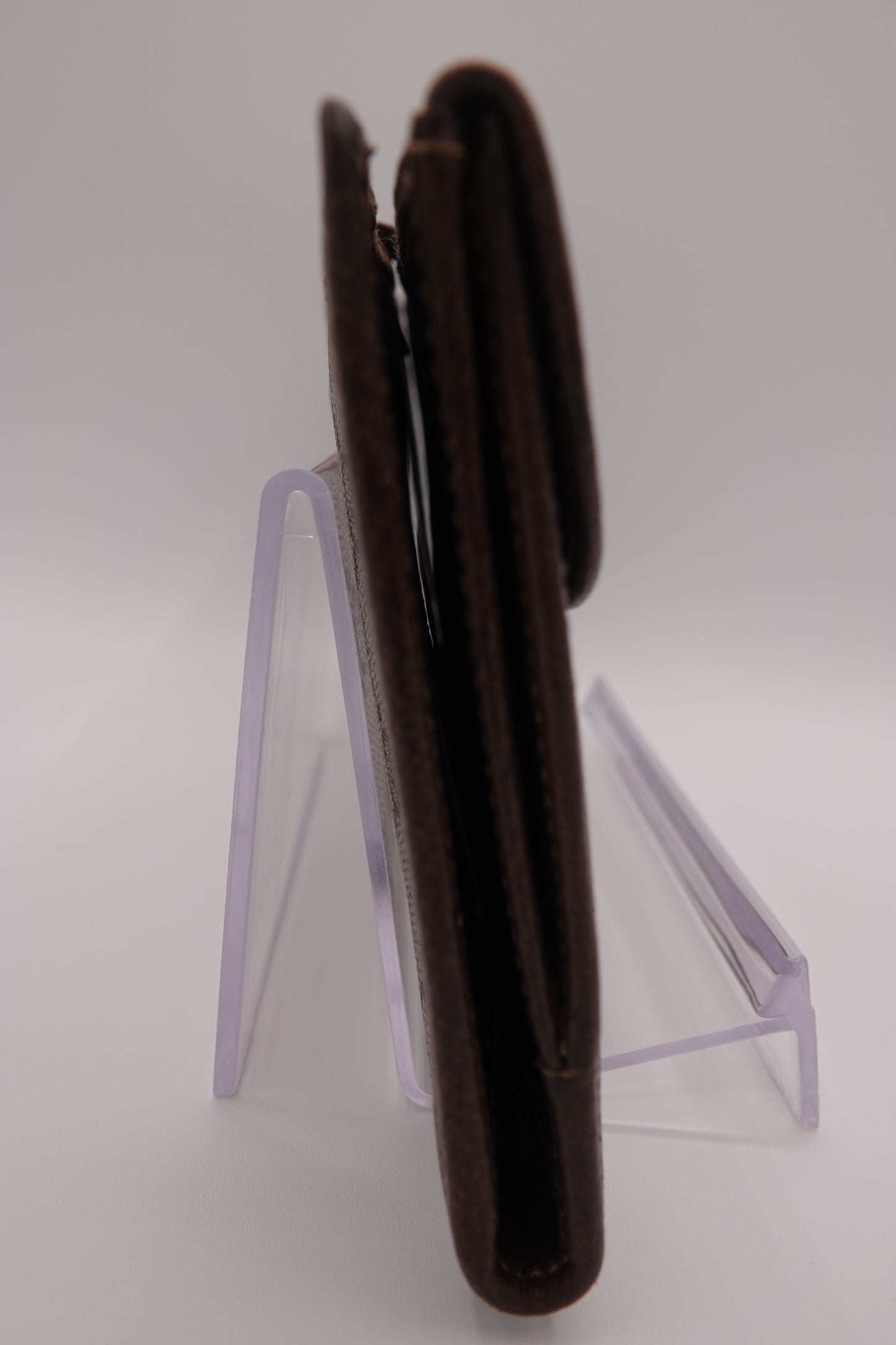 Brown leather wallet on a white background
