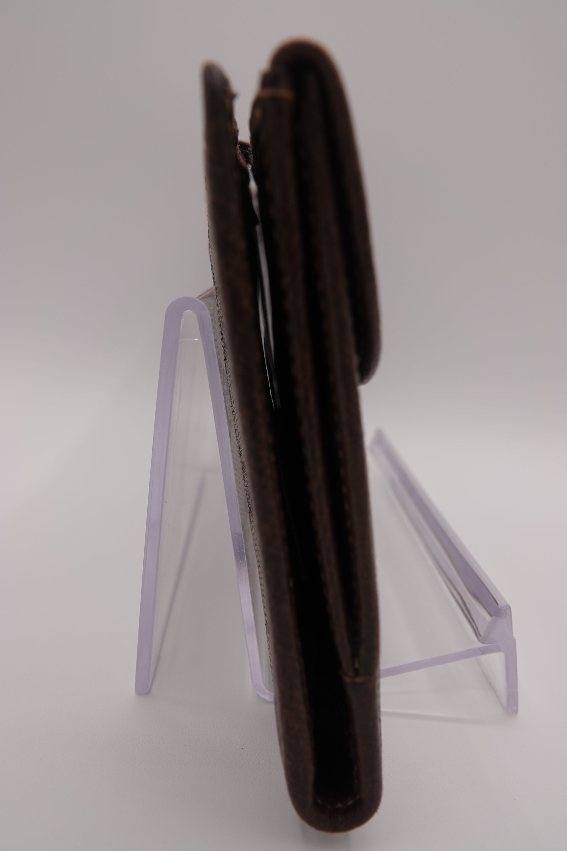 Brown leather wallet on a white background