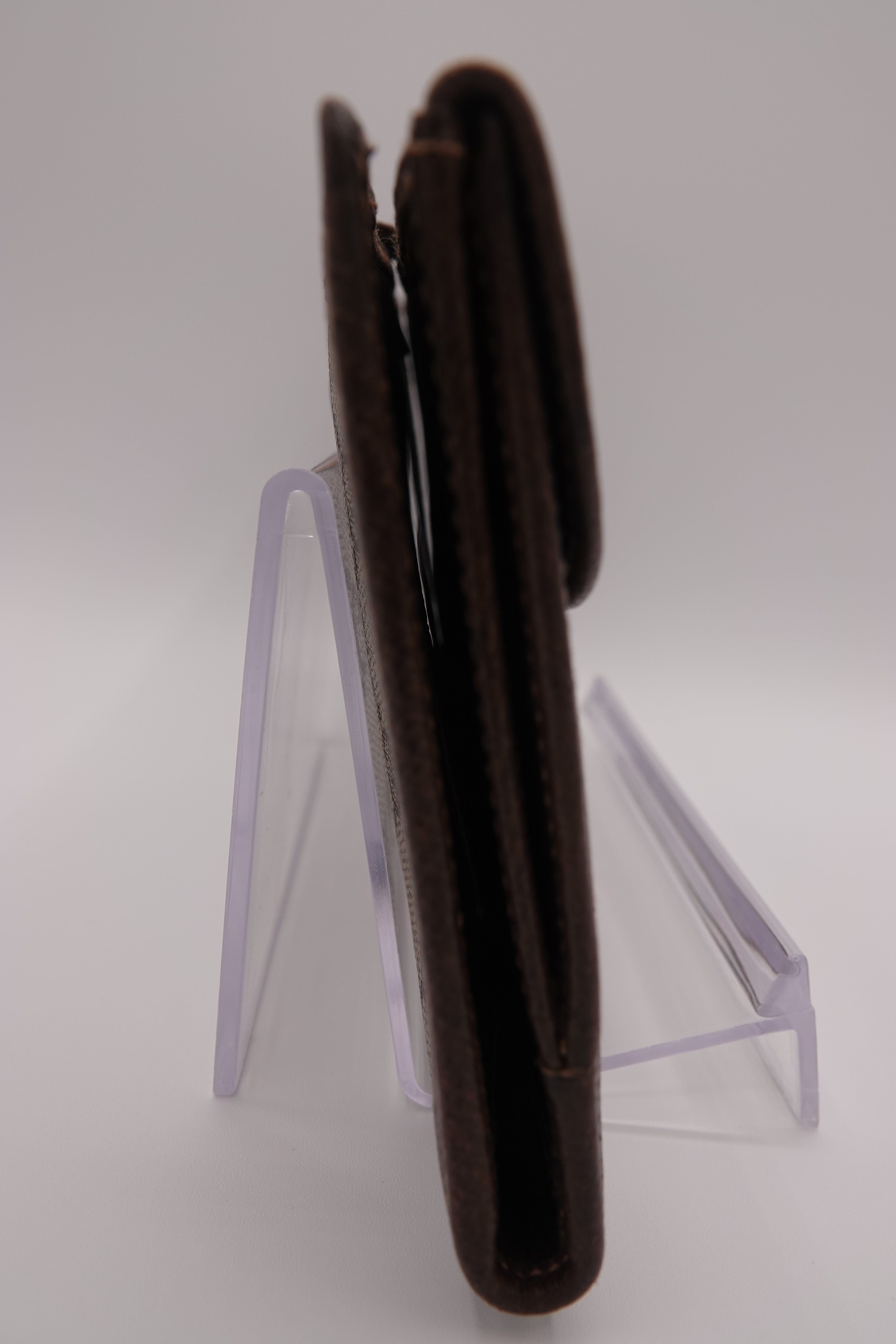 Brown leather wallet on a white background
