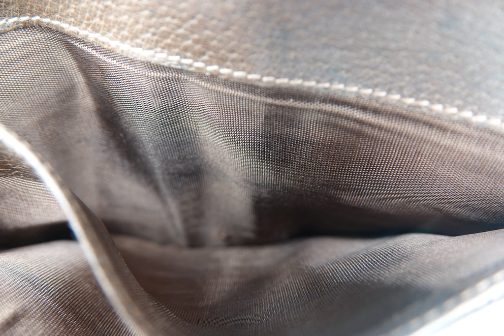 Close-up of gray fabric with a subtle pattern