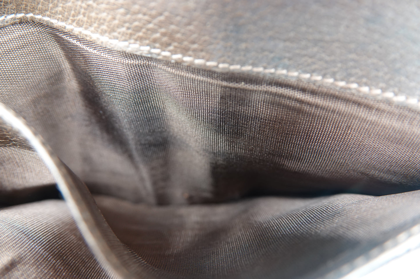 Close-up of gray fabric with a subtle pattern