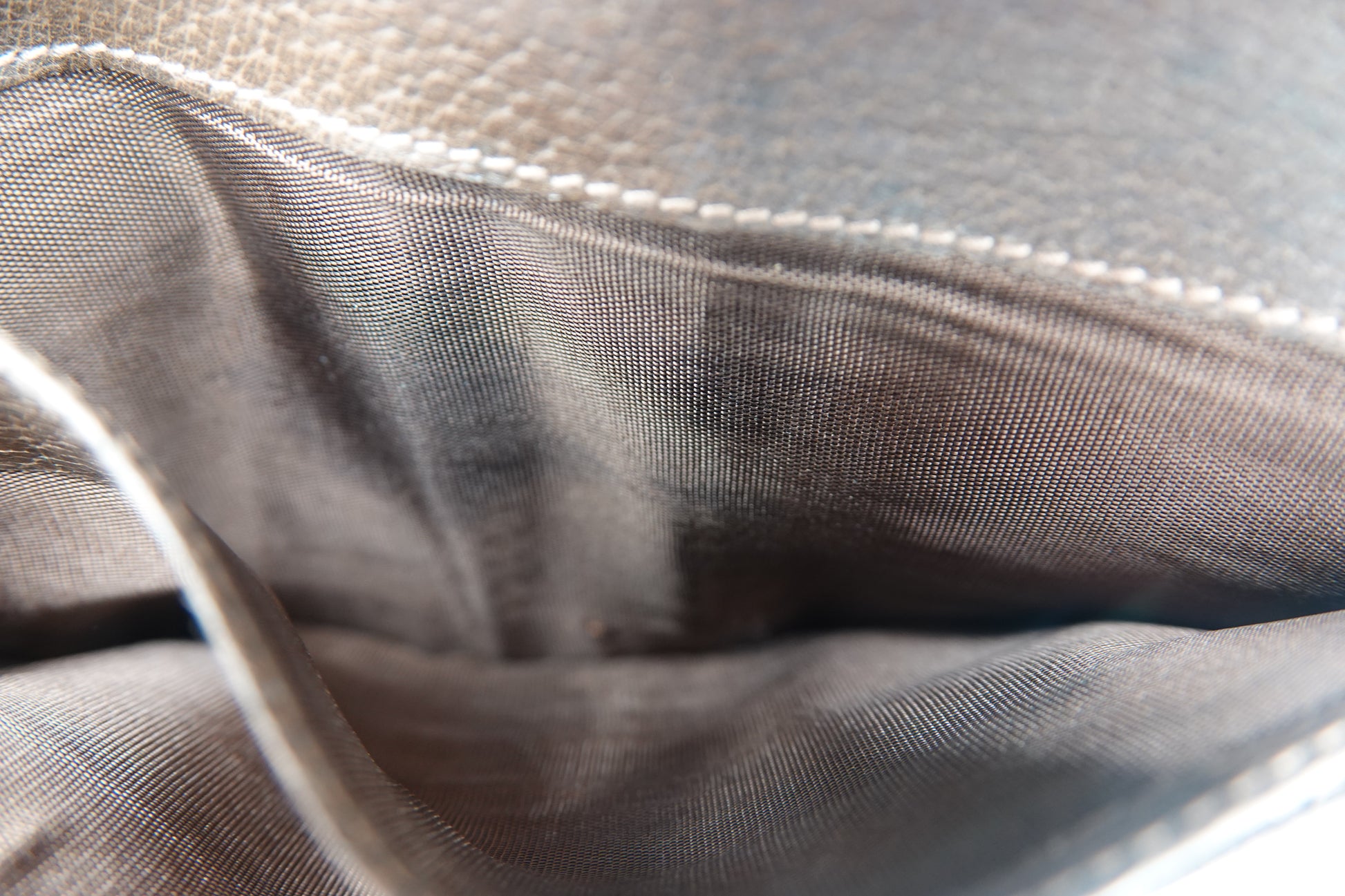 Close-up of gray fabric with a subtle pattern