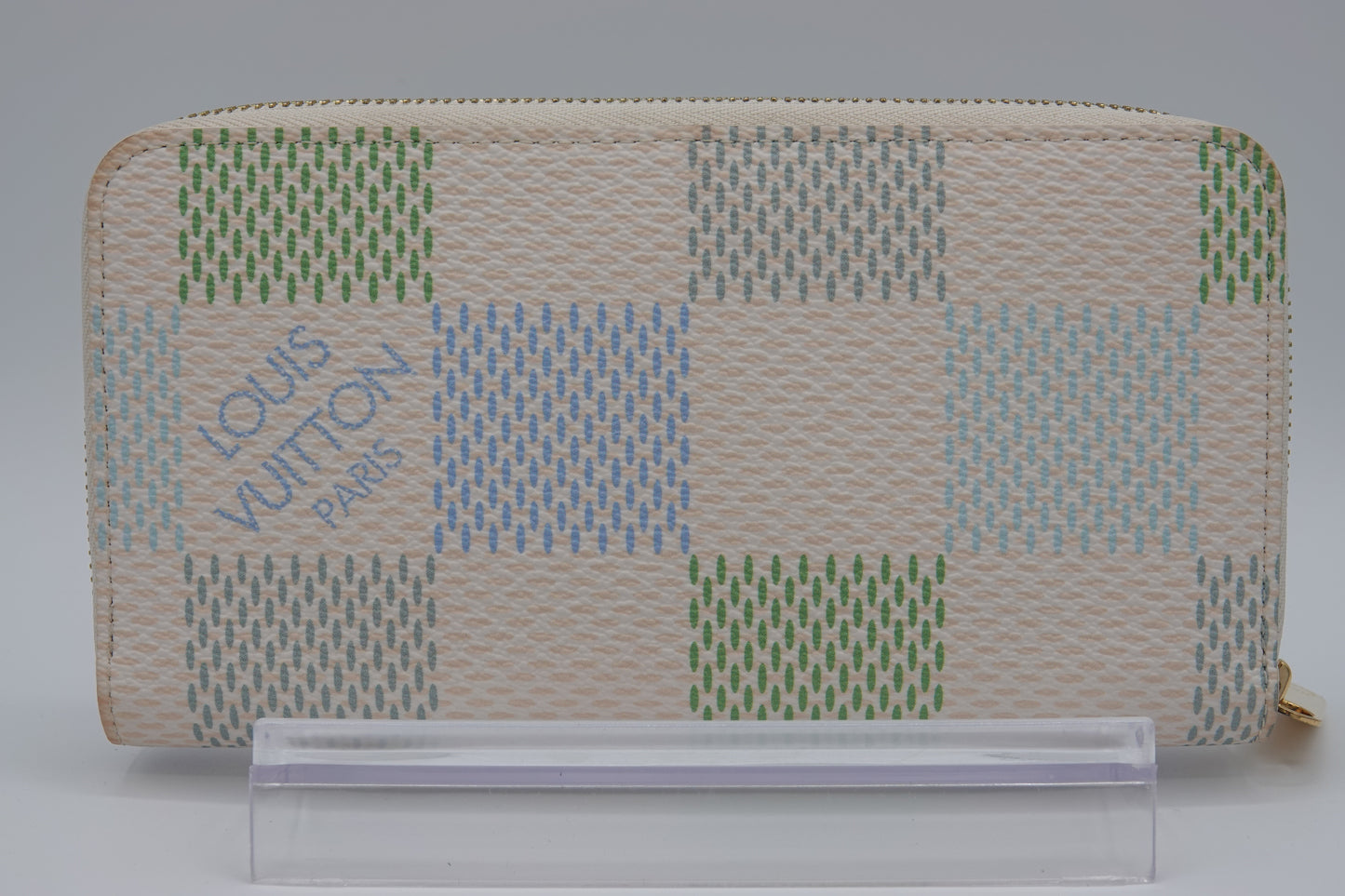 Louis Vuitton wallet with a checkered pattern on a stand