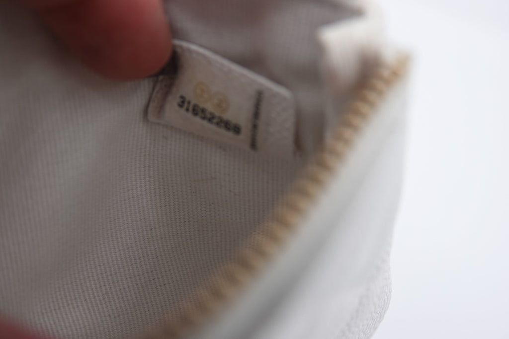 Close-up of a label on a white garment with a blurred background