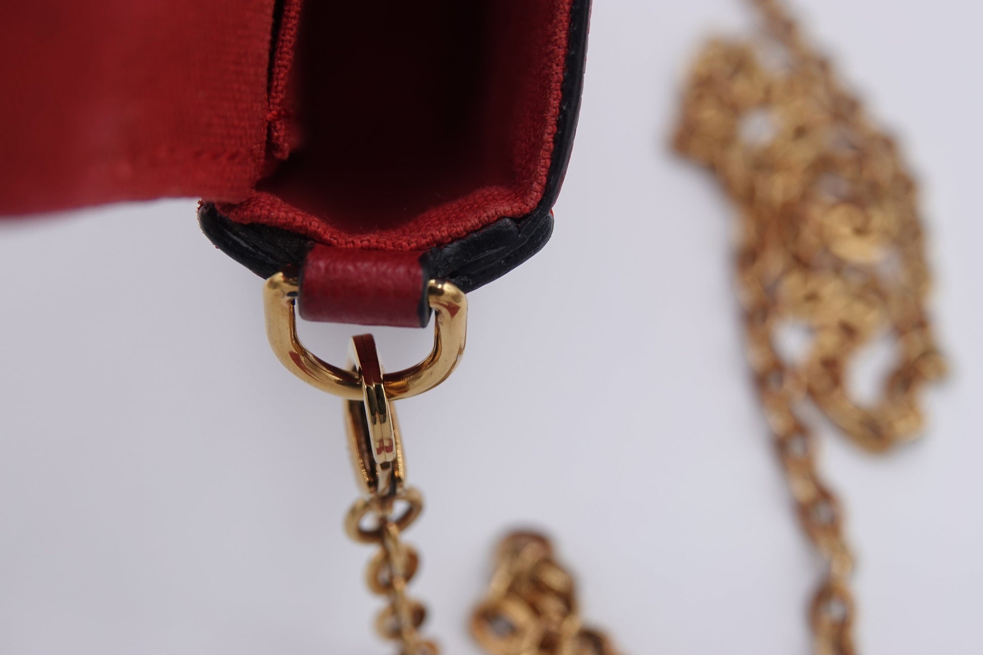 Red top with gold hardware