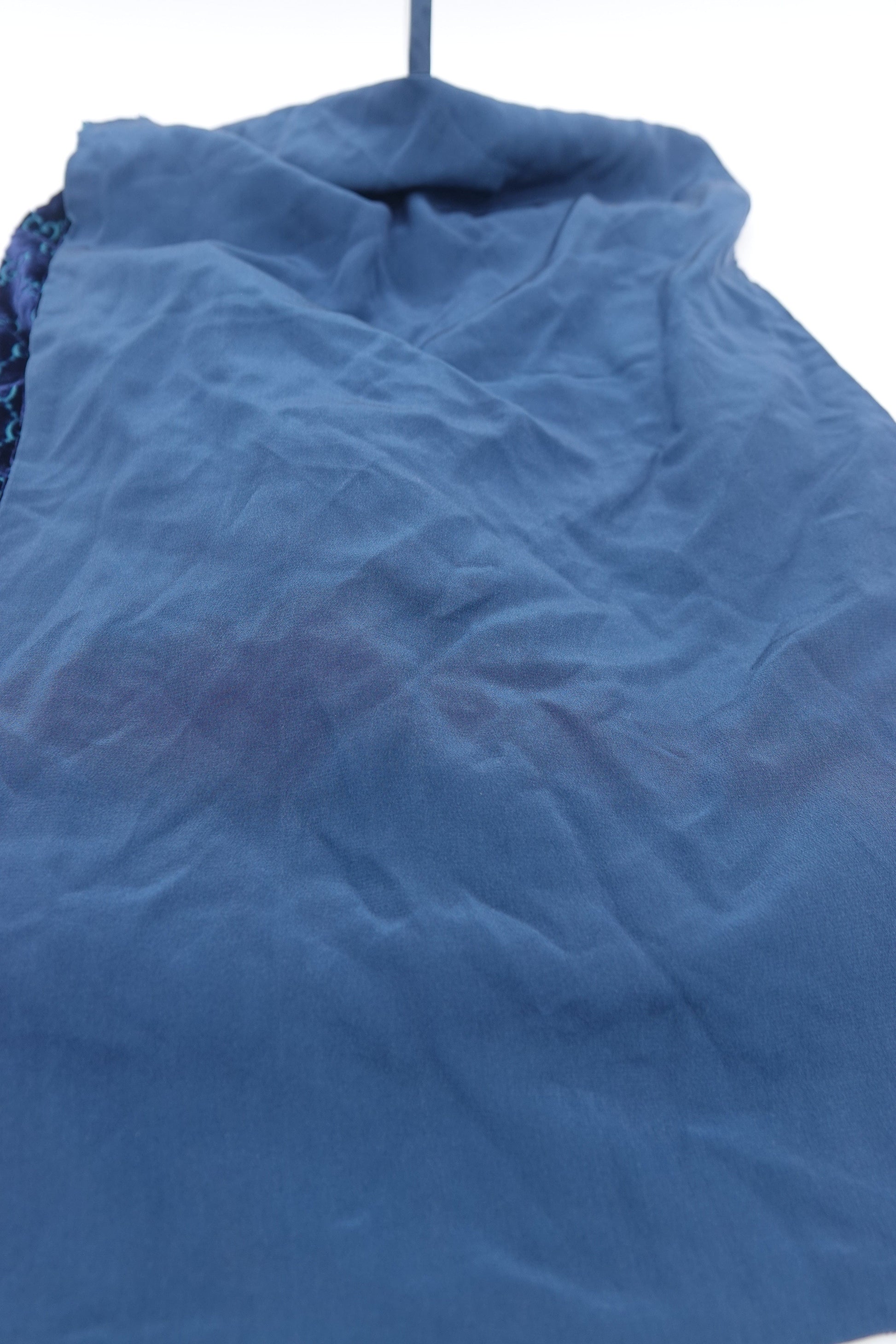 Blue textured fabric on a white background