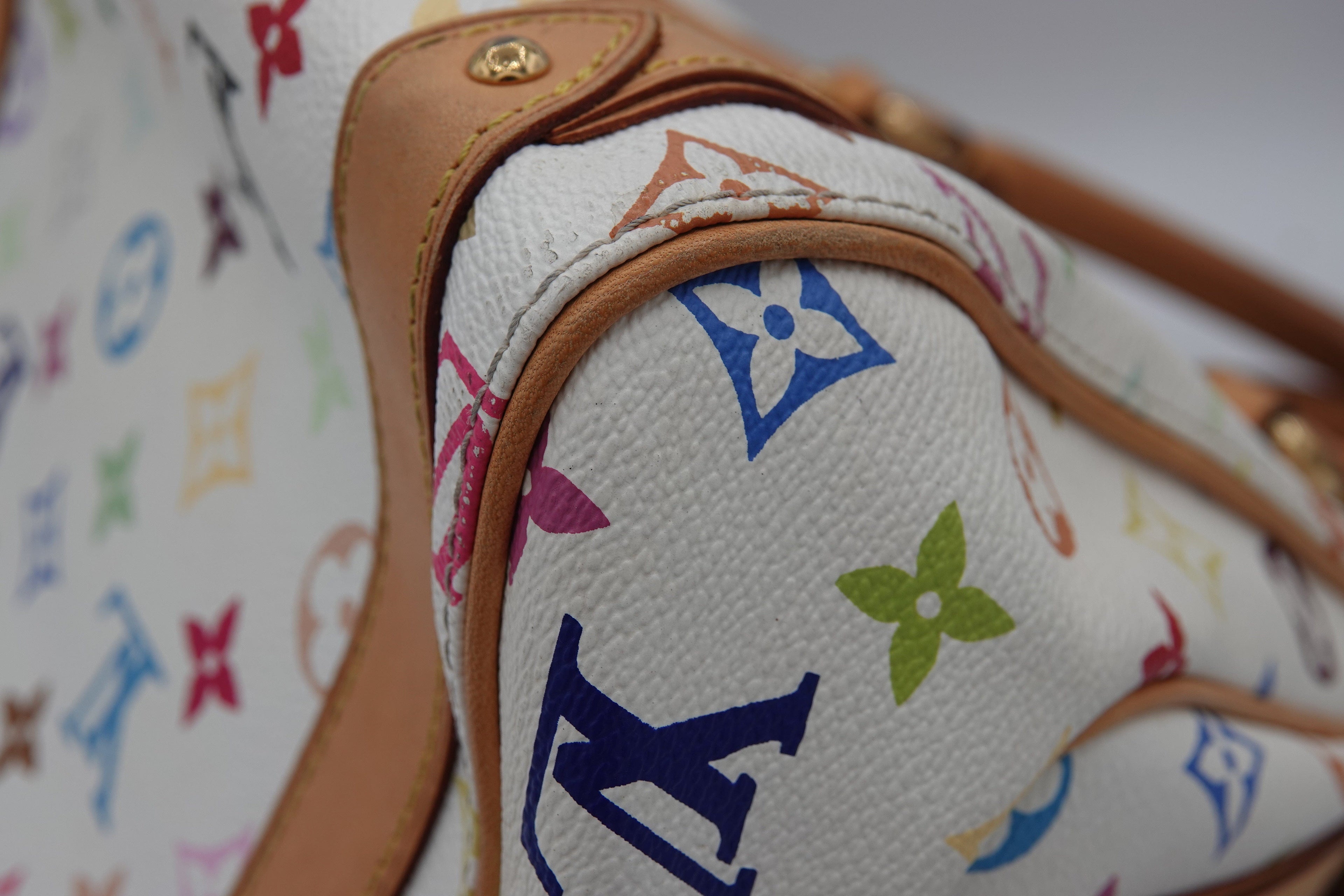 Louis Vuitton handbag with multicolor monogram pattern