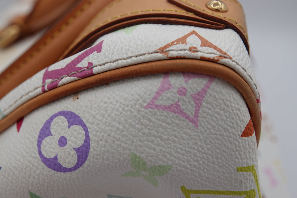 Close-up of a Louis Vuitton bag with multicolor monogram pattern.