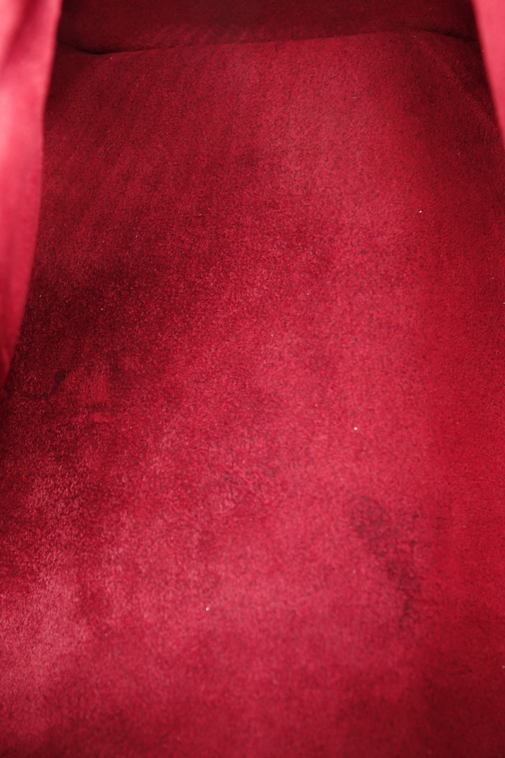 Close-up of red fabric with a textured surface