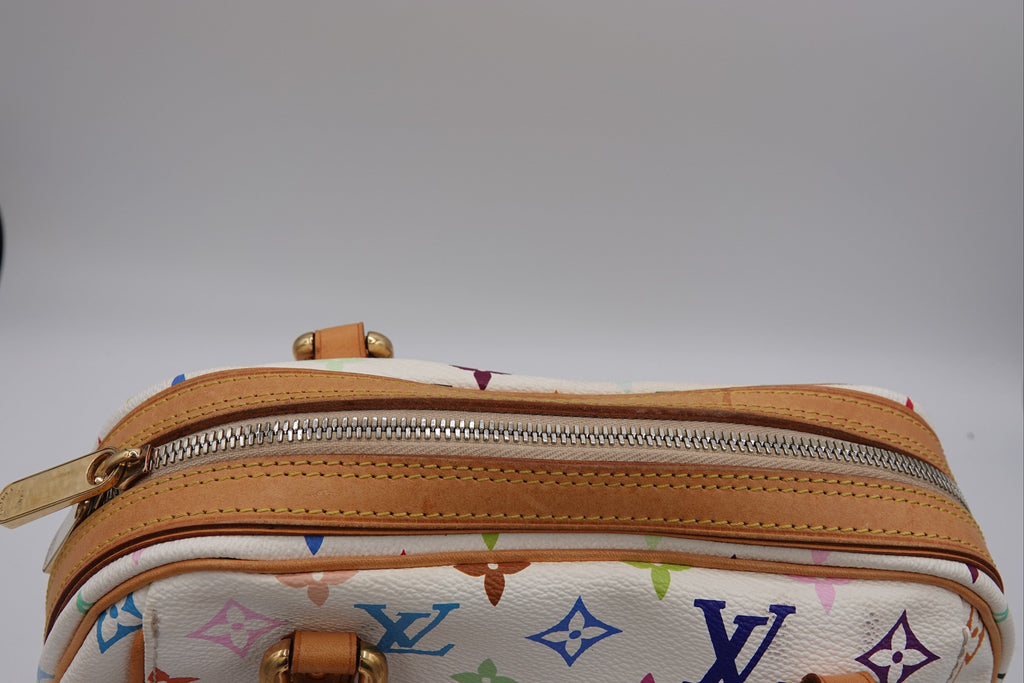 Designer handbag with multicolor monogram pattern on a white background