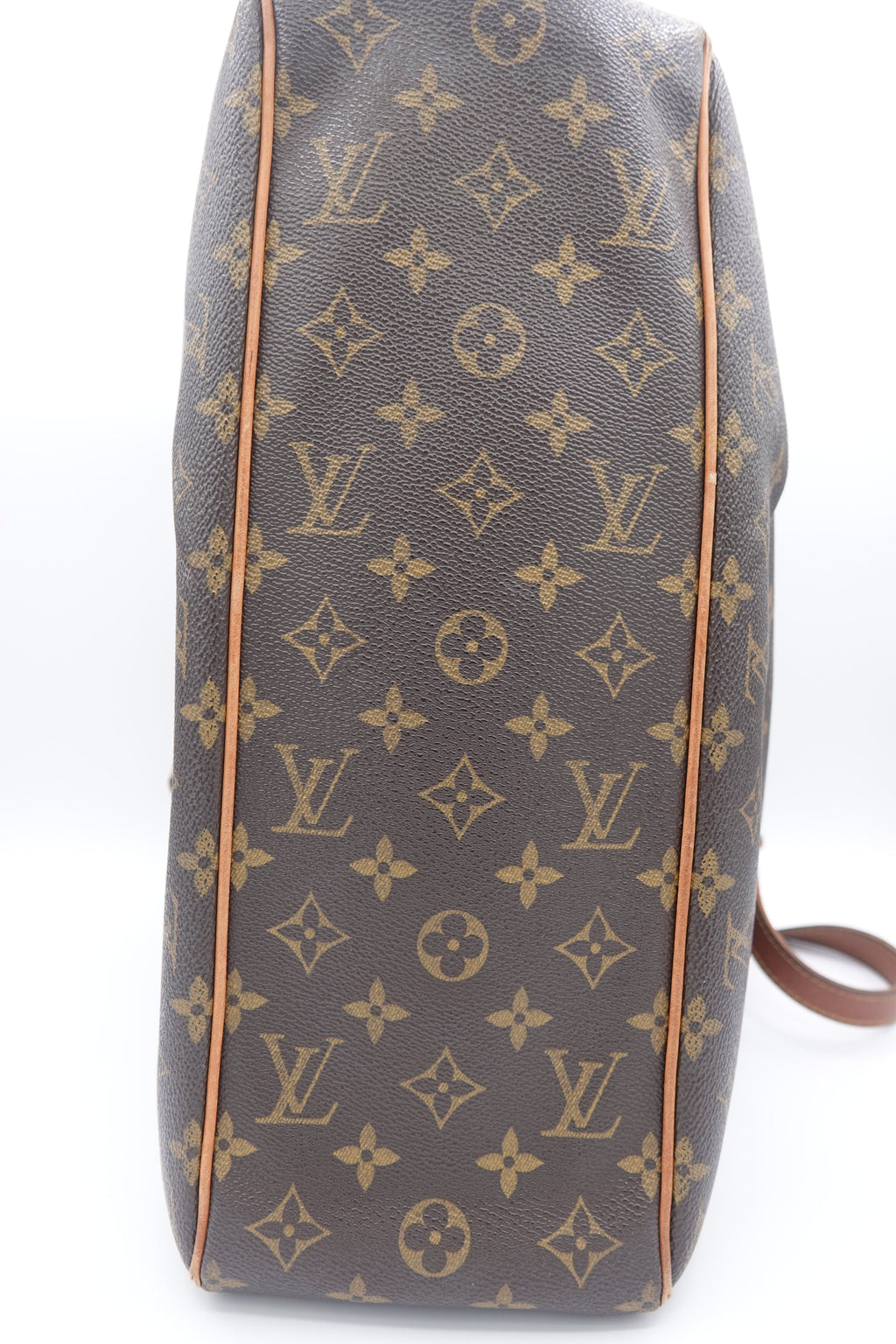 Louis Vuitton monogram handbag on a white background