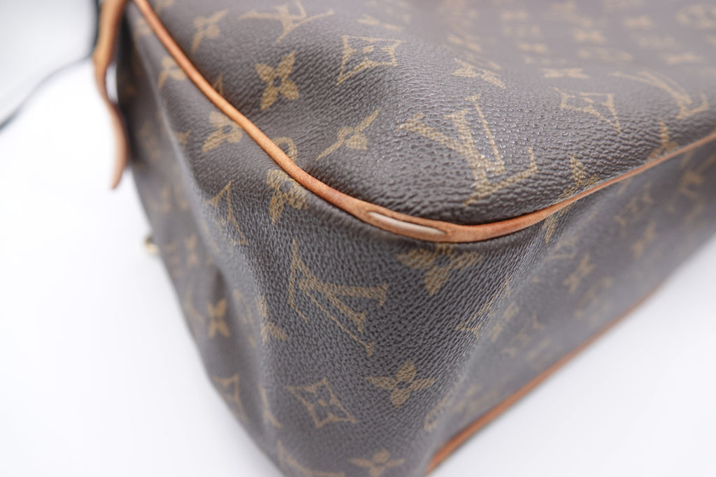 Louis Vuitton monogram bag on a white background