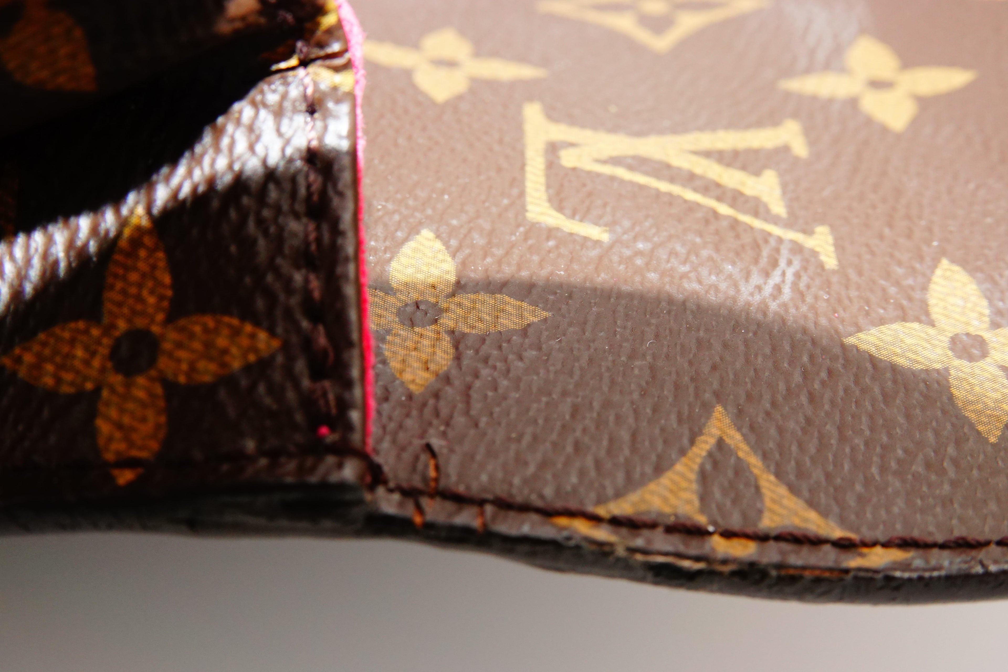 Close-up of a Louis Vuitton handbag with monogram pattern