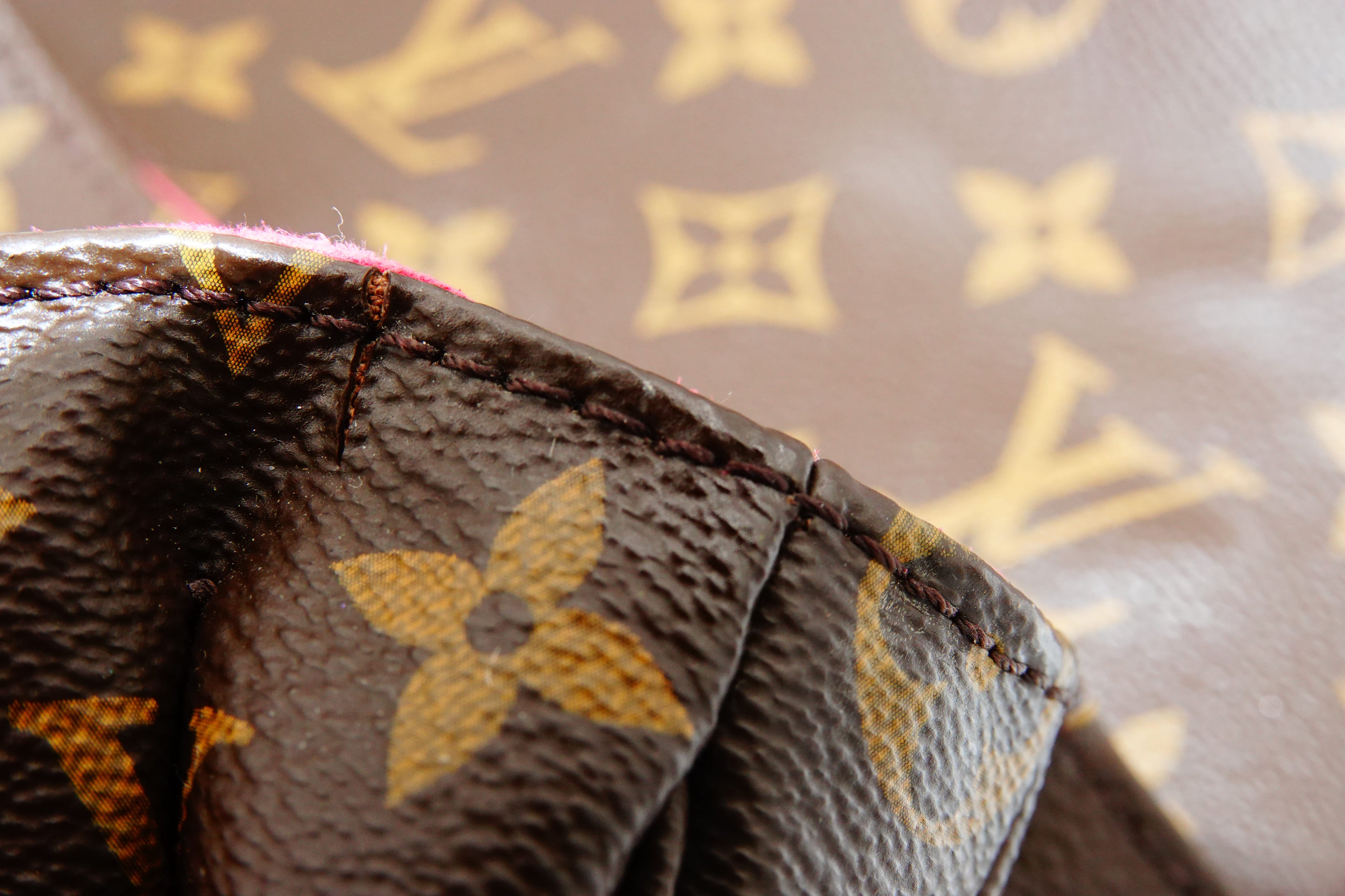 Close-up of a Louis Vuitton handbag with monogram pattern