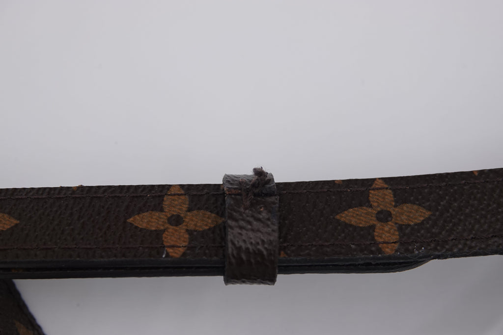 Brown belt with pattern on a white background