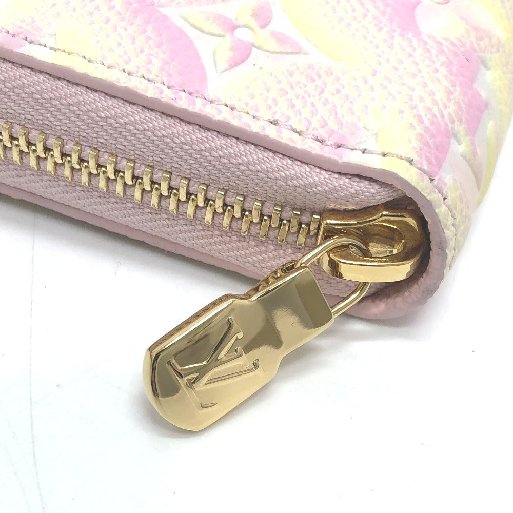 zipper pull Louis Vuitton Empreinte Monogram Summer Stardust Zippy Wallet Pink