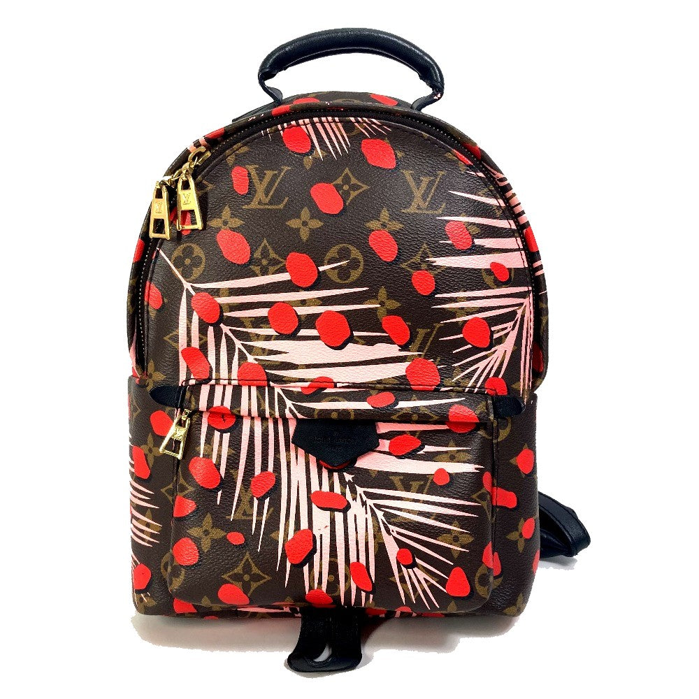 Backpack with red heart and palm leaf pattern on a white background