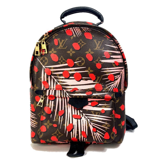 Backpack with red heart and palm leaf pattern on a white background