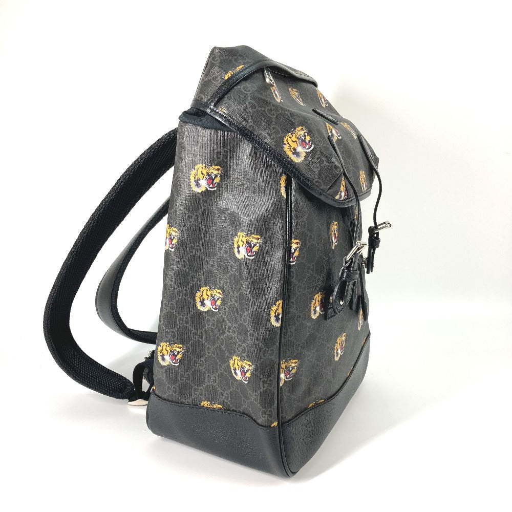 Backpack with tiger logo pattern on a white background