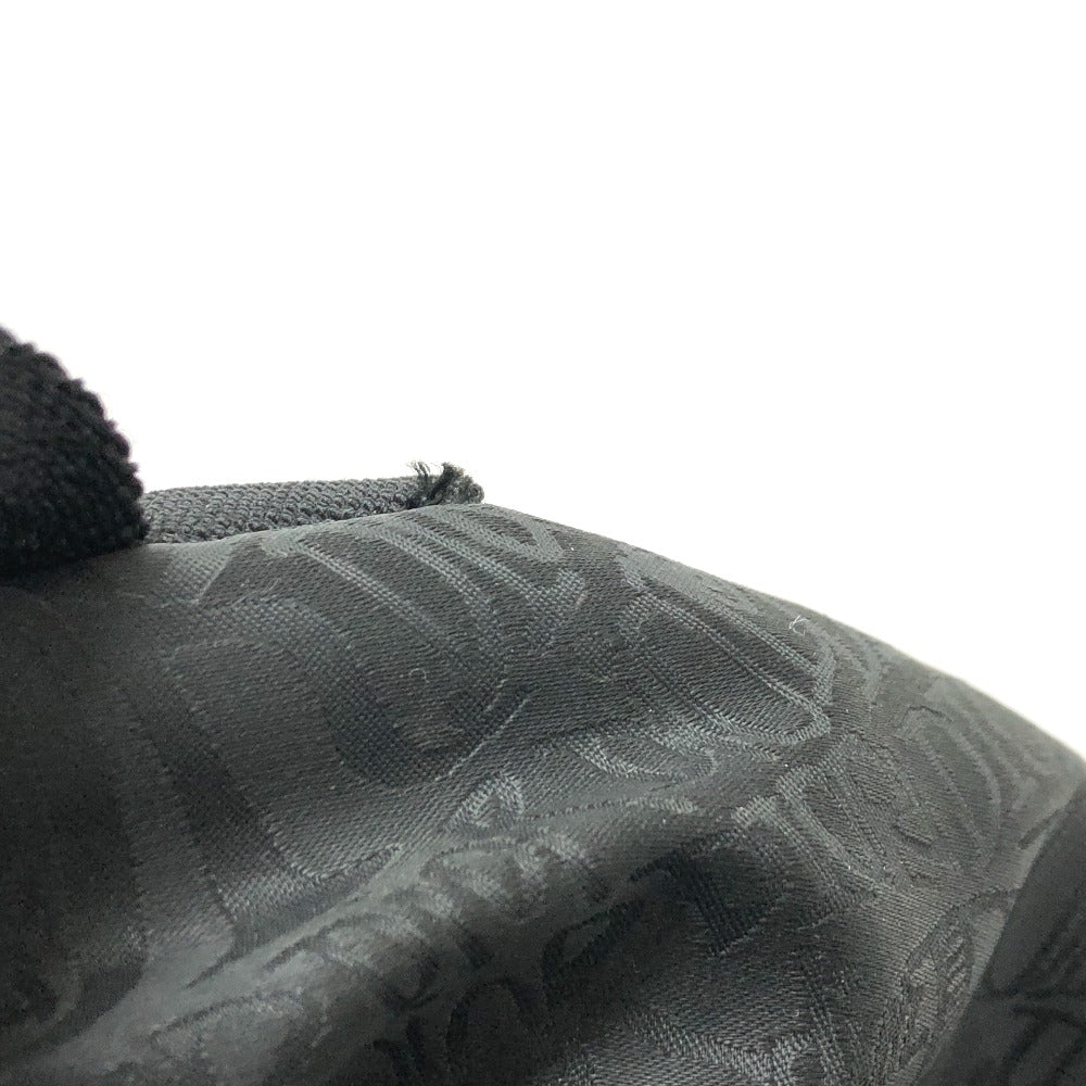 Close-up of a textured gray fabric with a subtle pattern on a white background