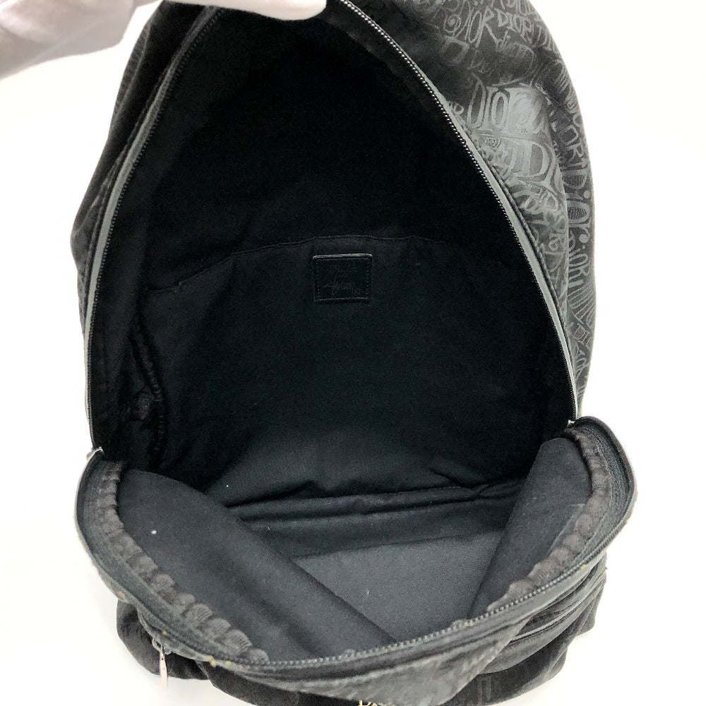 Gray backpack with black interior on a white background