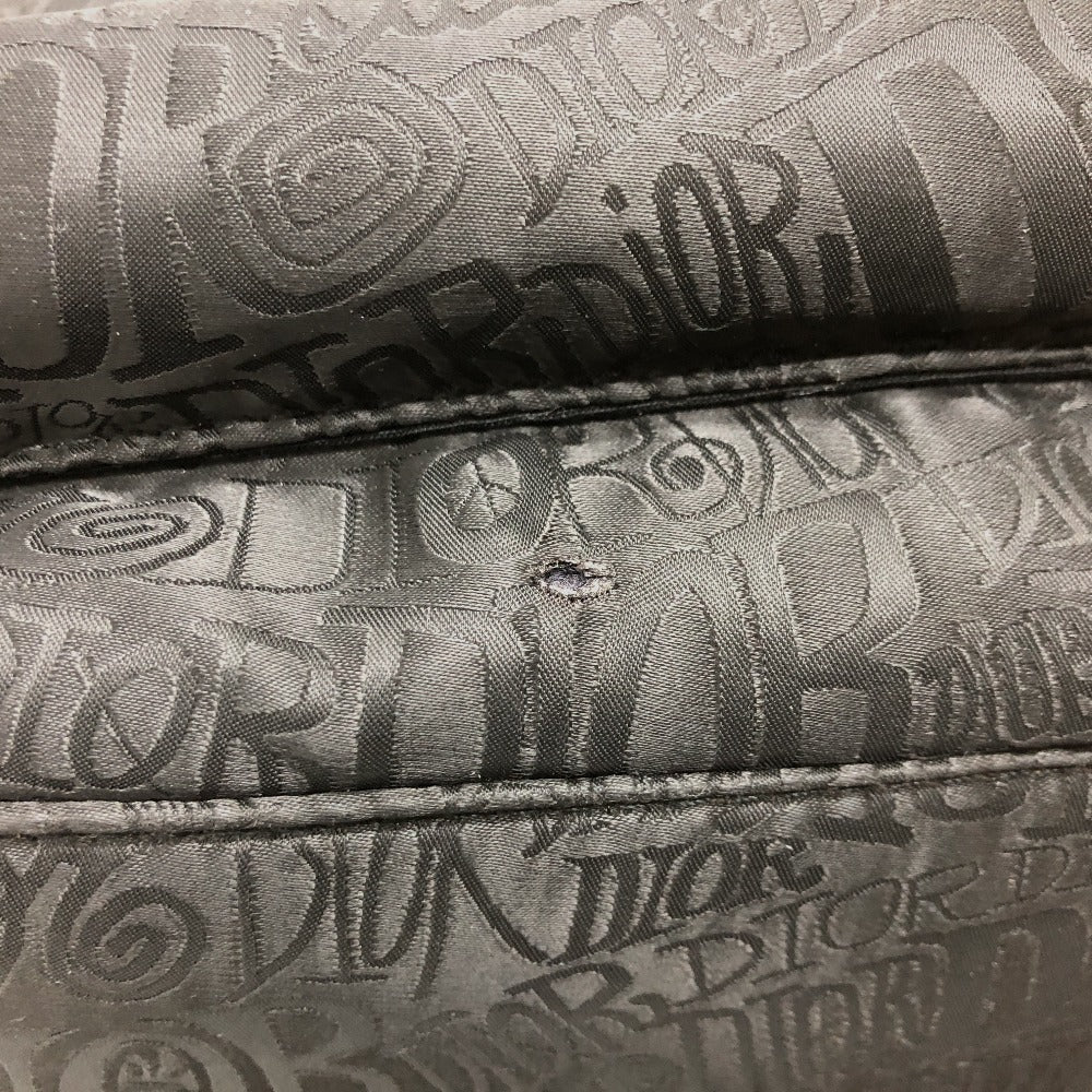 Close-up of Dior fabric with branding