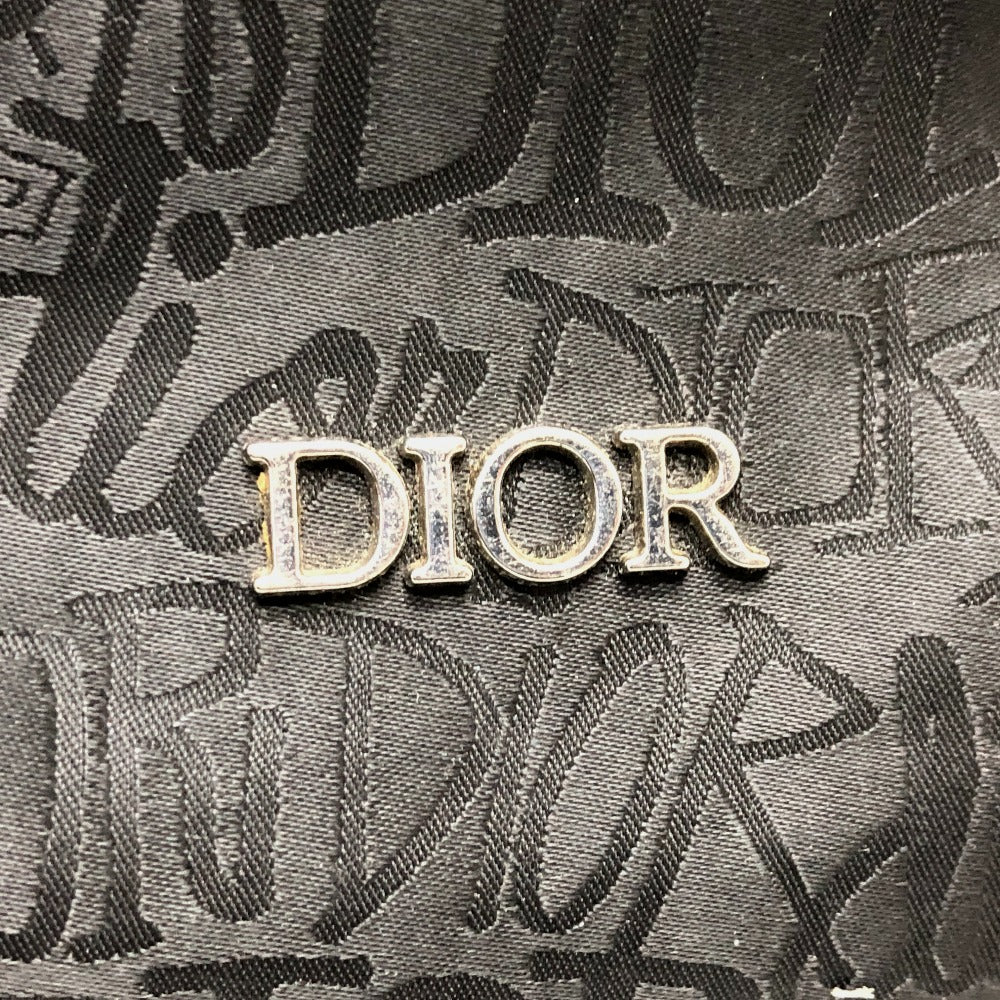 Dior logo on a textured fabric background