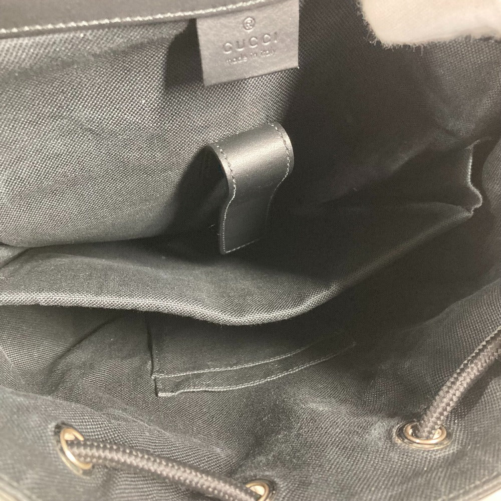Close-up of a Gucci bag with visible branding.