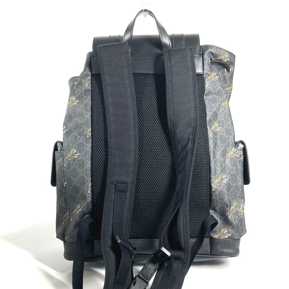 Gray backpack with black straps on a white background