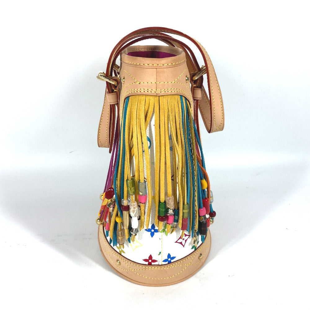 Leather handbag with colorful fringes on a white background
