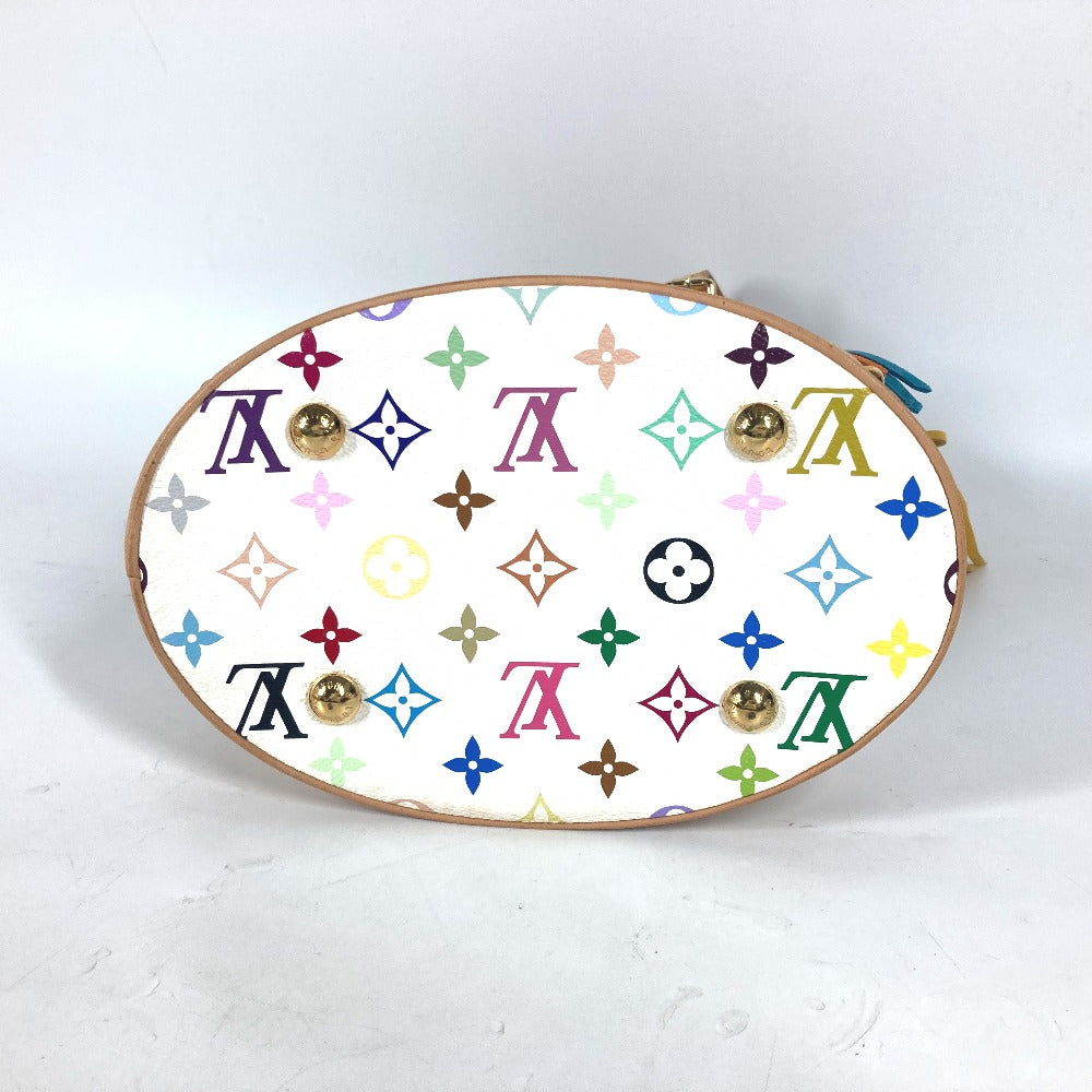 Round jewelry dish with multicolored pattern on a white background