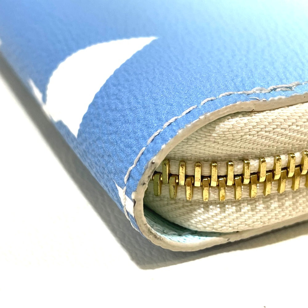 bottom corner Louis Vuitton Monogram Giant By The Pool Zippy Wallet Blue
