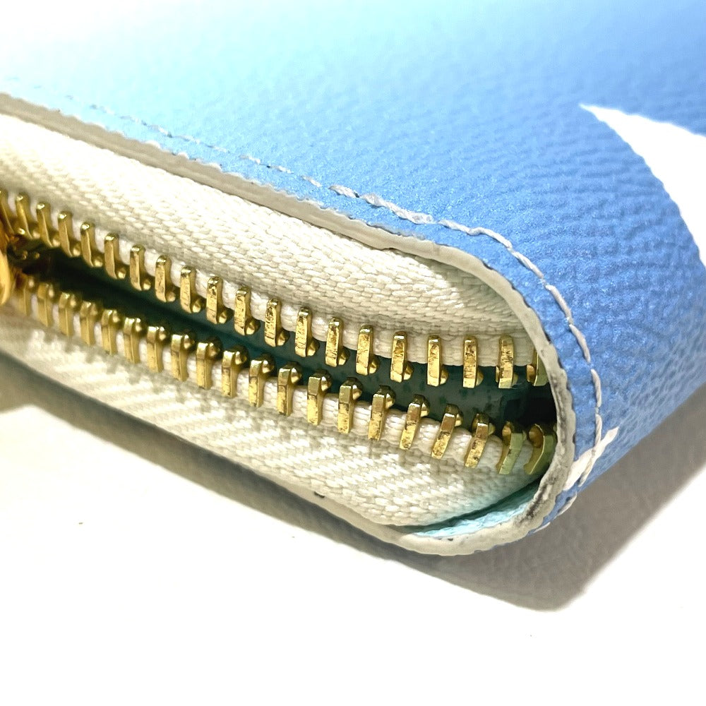 bottom corner Louis Vuitton Monogram Giant By The Pool Zippy Wallet Blue