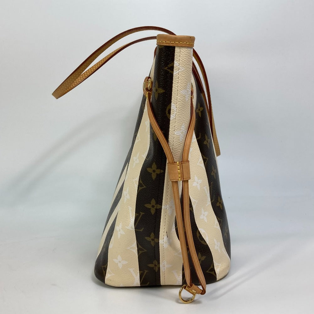 Designer handbag with brown strap and patterned design on a white background