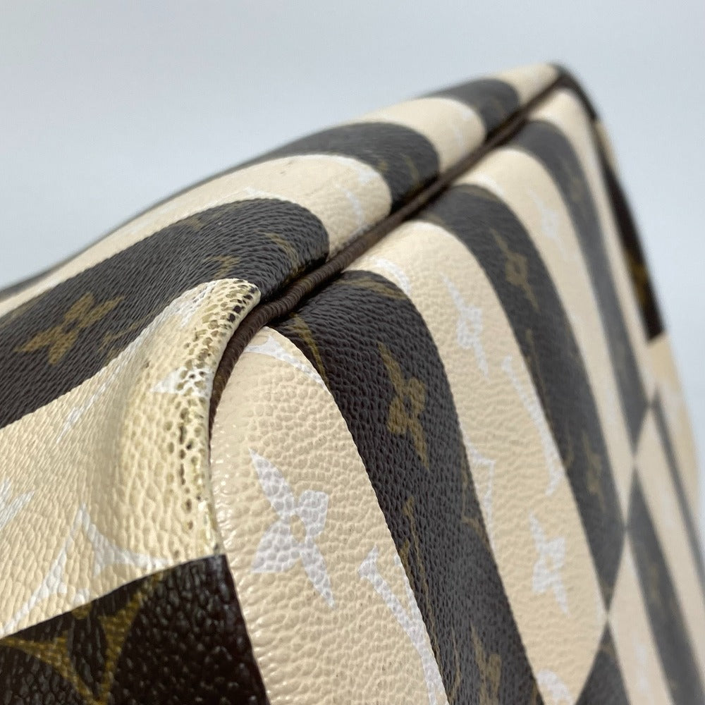 Close-up of a patterned fabric with a brand logo on a light background