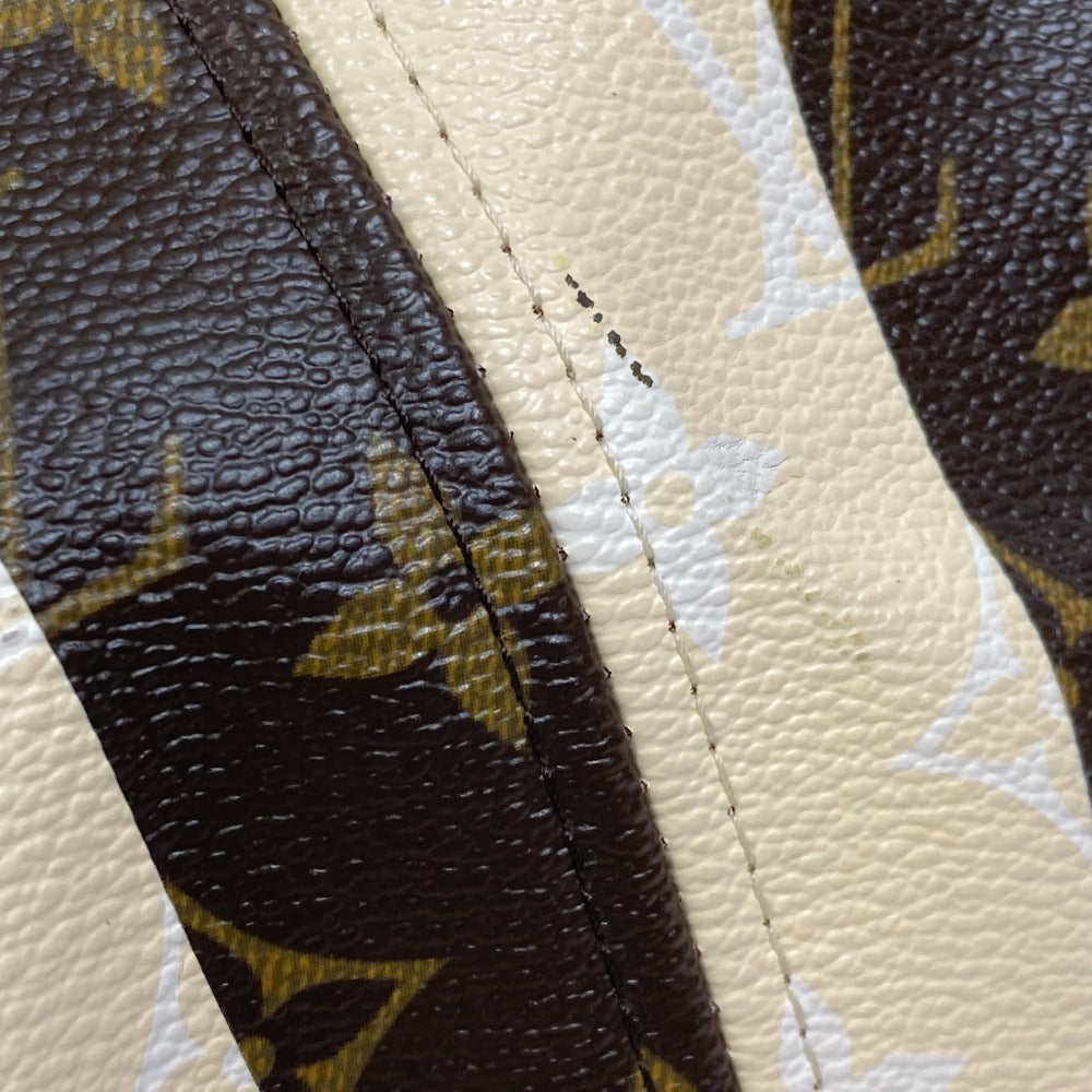 Close-up of a textured fabric with a floral pattern on a beige background