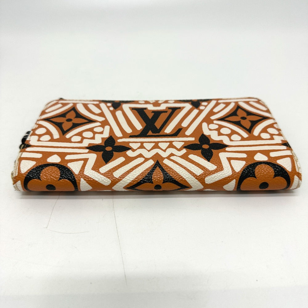 bottom Louis Vuitton Monogram Giant Crafty Zippy Wallet Creme Caramel