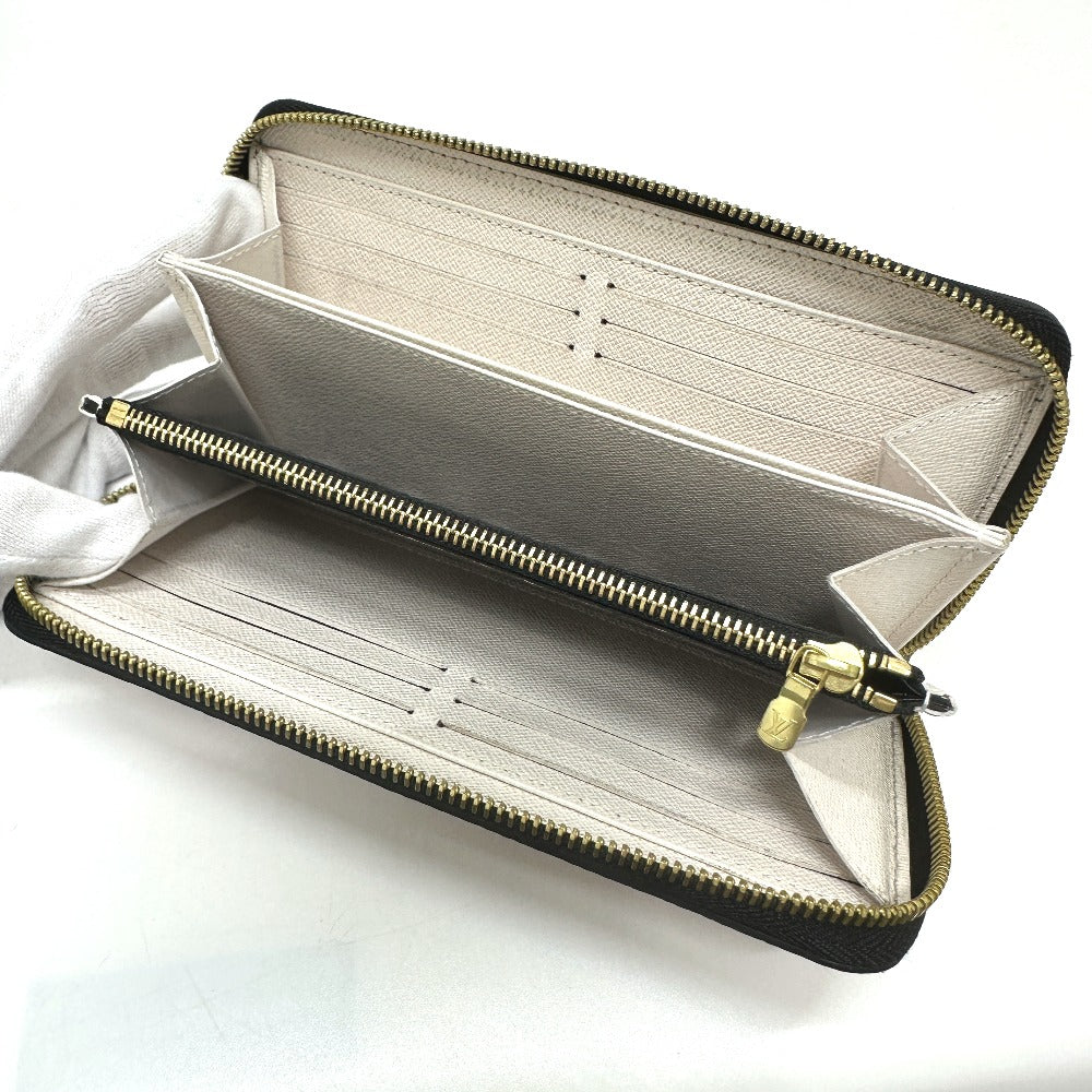 zipper pocket Louis Vuitton Monogram Giant Crafty Zippy Wallet Creme Caramel