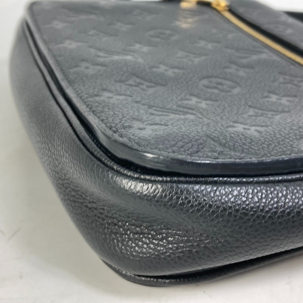 front corner Louis Vuitton Empreinte Leather Pochette Metis Black