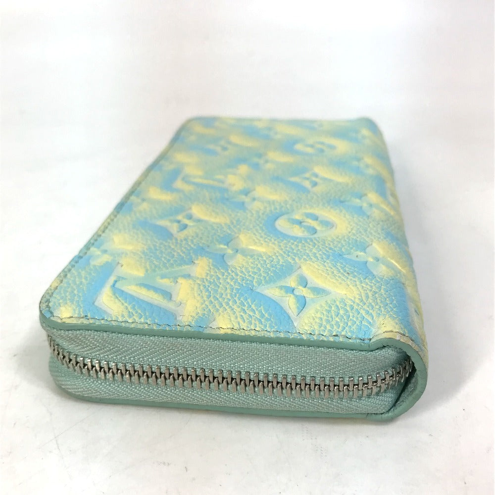 side Louis Vuitton Empreinte Monogram Summer Stardust Long Zippy Wallet Green