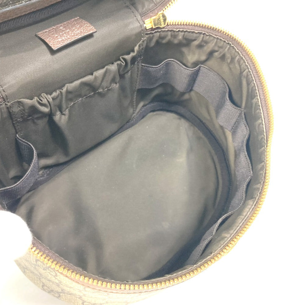 Open black bag with gold zipper on a white background