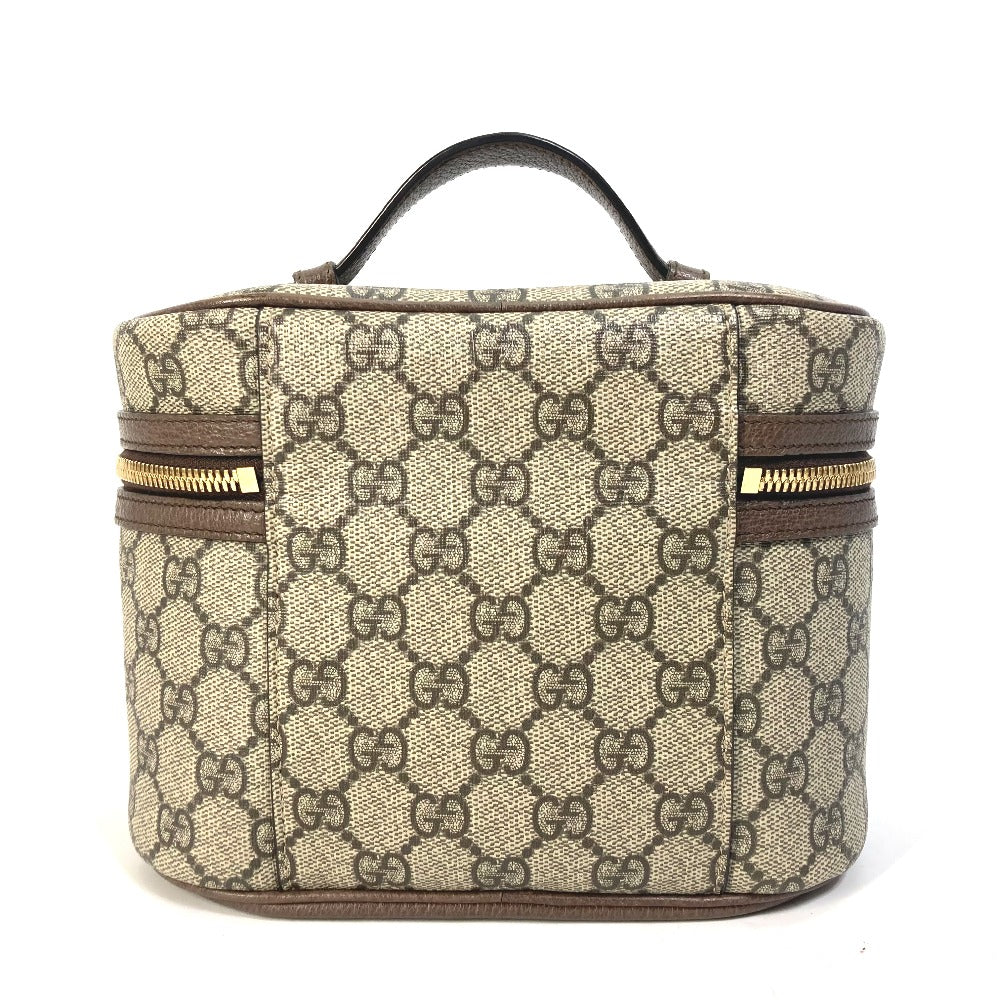 Cosmetic bag with Gucci pattern on a white background