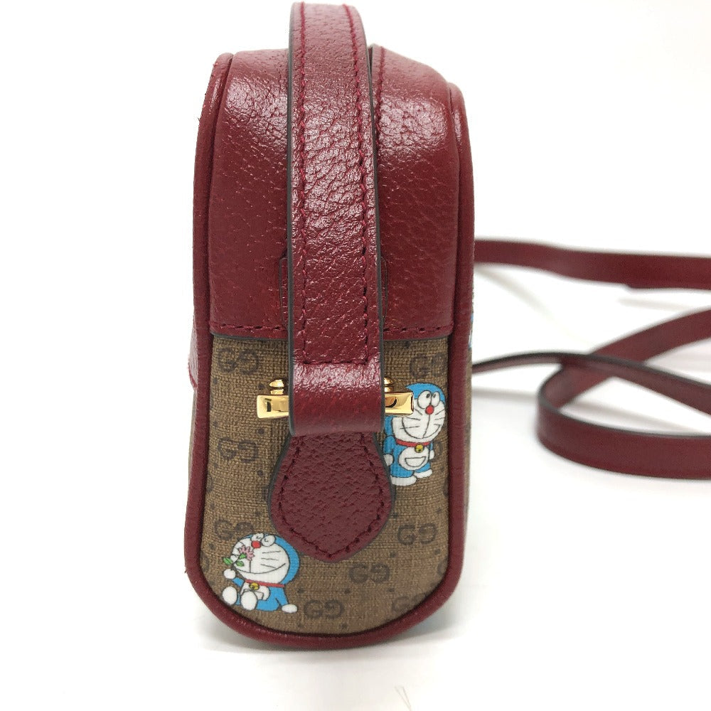 side Gucci X DORAEMON Mini Vintage GG Supreme Monogram Camera Bag