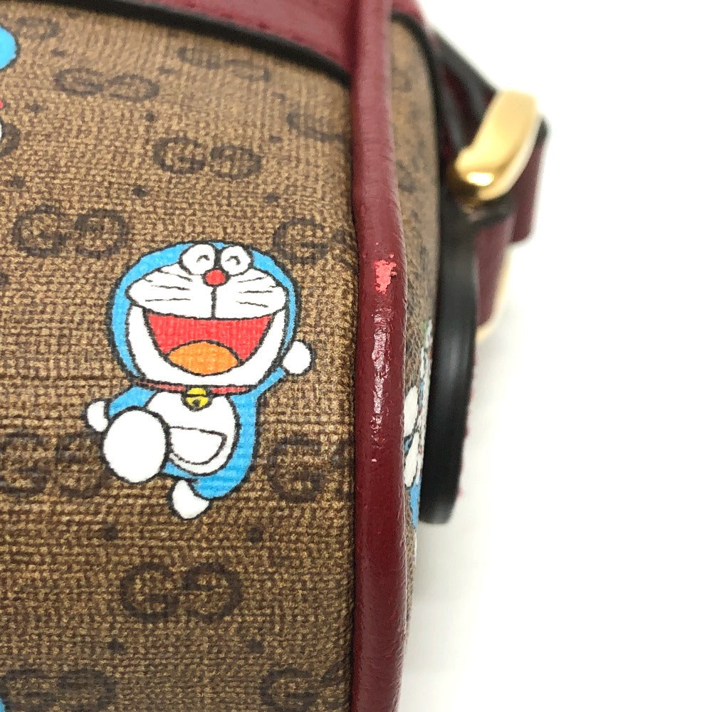 side corner Gucci X DORAEMON Mini Vintage GG Supreme Monogram Camera Bag