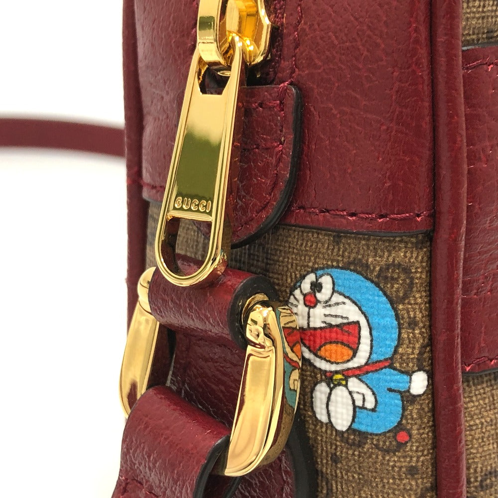 gold hardware Gucci X DORAEMON Mini Vintage GG Supreme Monogram Camera Bag